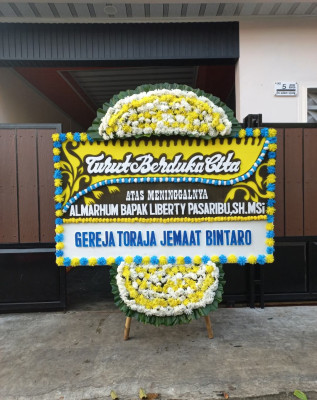 Papan Bunga Duka di Sambeng